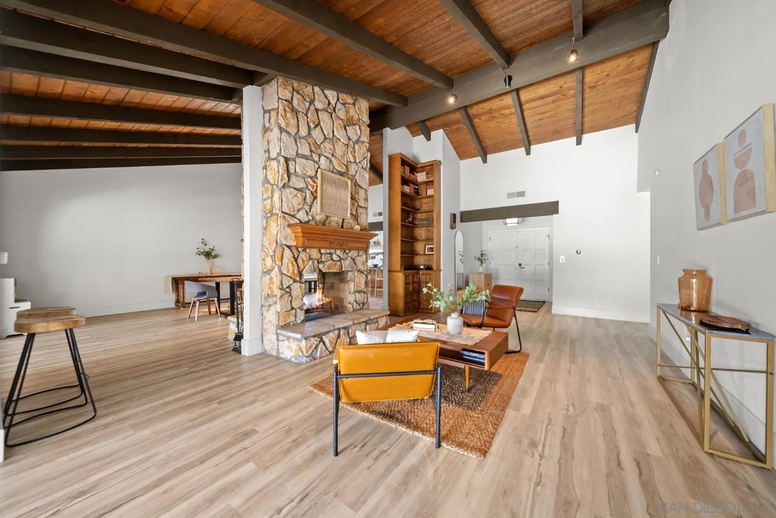 4010 Corral Canyon Road Bonita, CA 91902 - Photo 5 of 35 a living room with furniture a wooden floor and next to a window
