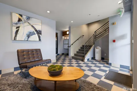 a room with furniture and rug