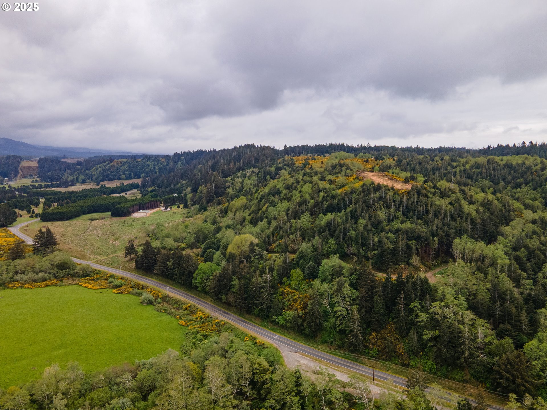 Elk River Road Port Orford, OR 97465 - Photo 3 of 22 a view of a lake with a city