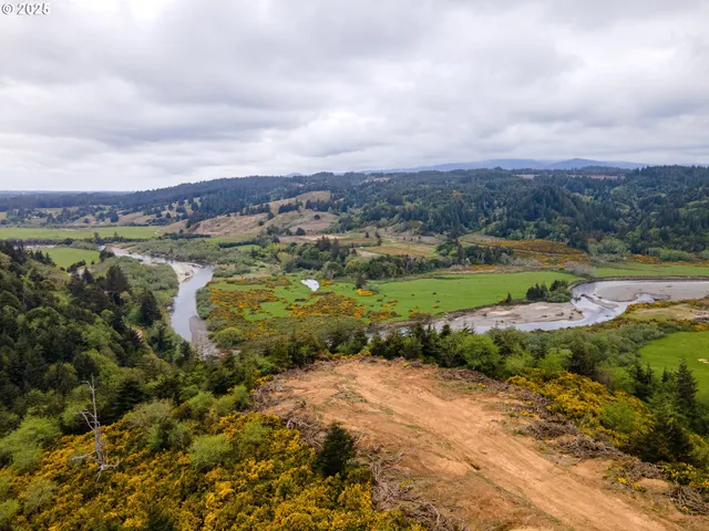 a view of a lake with mountains in the background