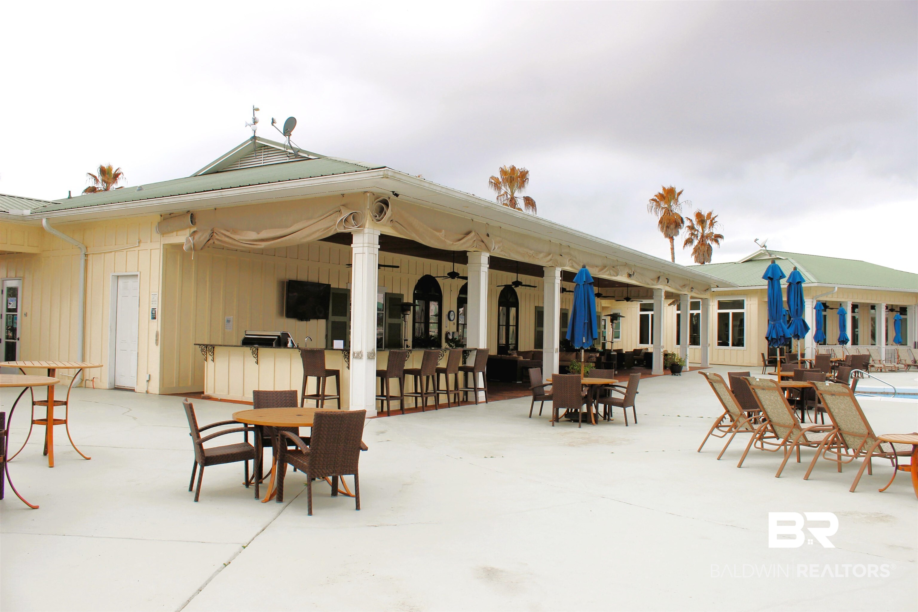 28152 Migratory Way Elberta, AL 36530 - Photo 30 of 54 View of patio featuring outdoor dining area and a ceiling fan