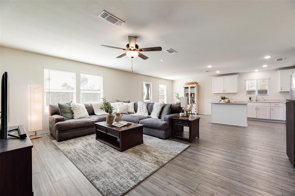 7005 Adderly Road Pilot Point, TX 76258 - Photo 7 of 38 spacious living area with ample natural light flowing in