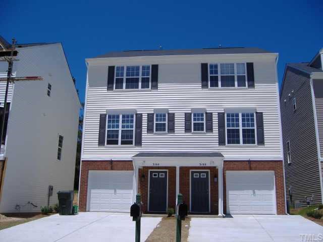 2200 Persimmon Ridge Drive Raleigh, NC 27604 - Photo 1 of 1 a building with a window and balcony