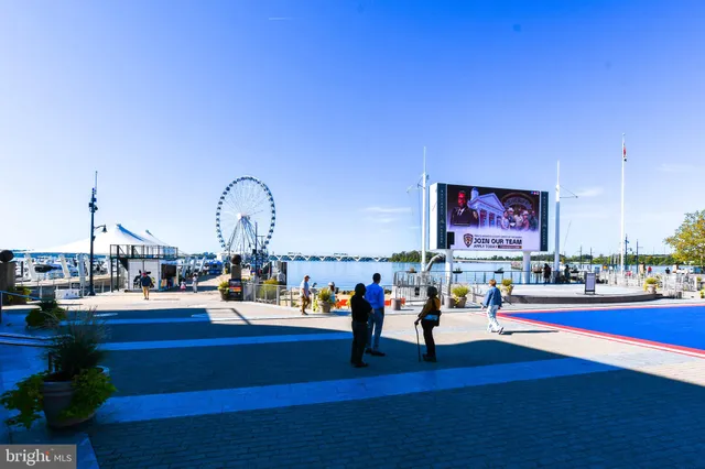a view of a building with sitting area