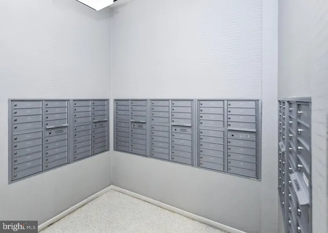 a view of a hallway with a white walls