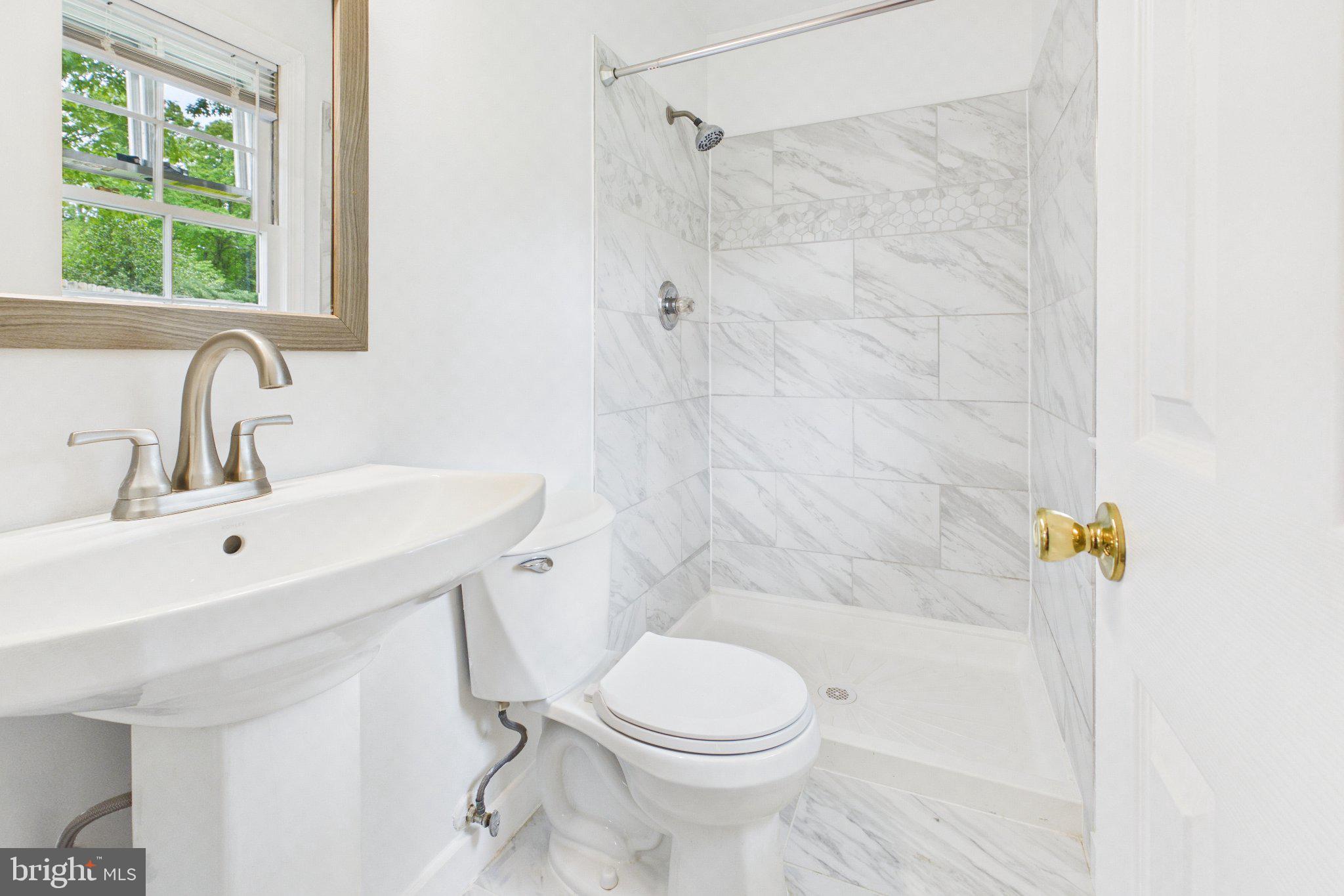 13235 Sturbridge Road Woodbridge, VA 22192 - Photo 48 of 53 Modern marble bathroom retreat.