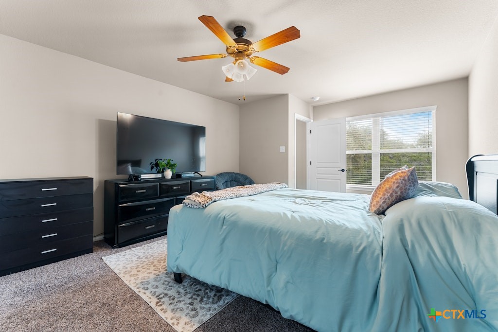 430 Archstone Loop Belton, TX 76513 - Photo 26 of 40 a bedroom with a bed and a dresser