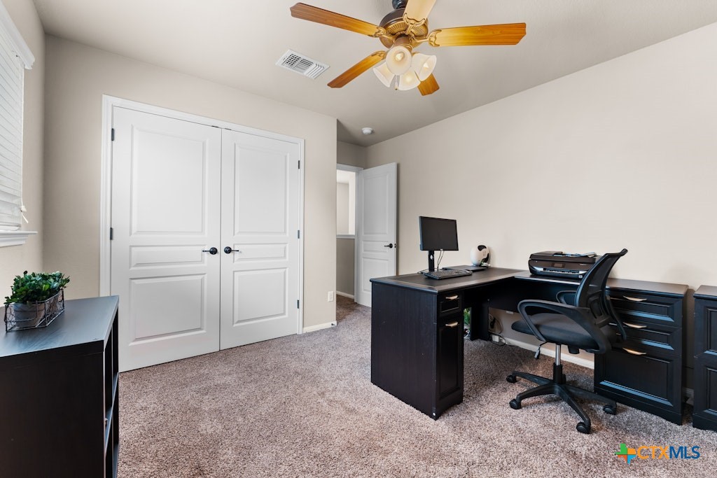 430 Archstone Loop Belton, TX 76513 - Photo 30 of 40 a view of a workspace with furniture and a window