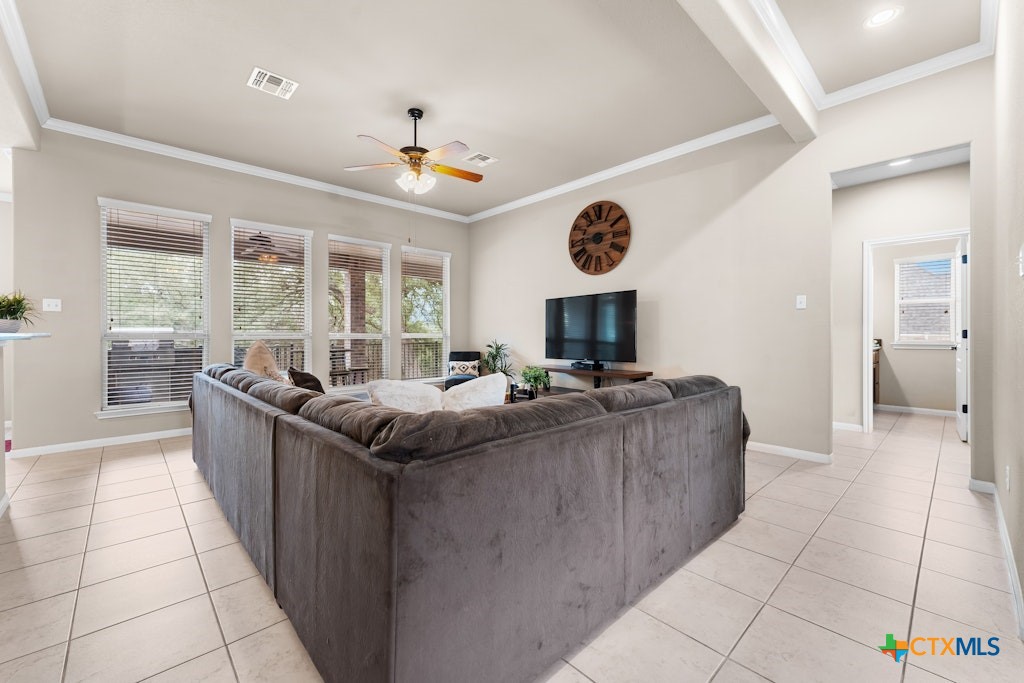 430 Archstone Loop Belton, TX 76513 - Photo 8 of 40 a living room with furniture and a open kitchen