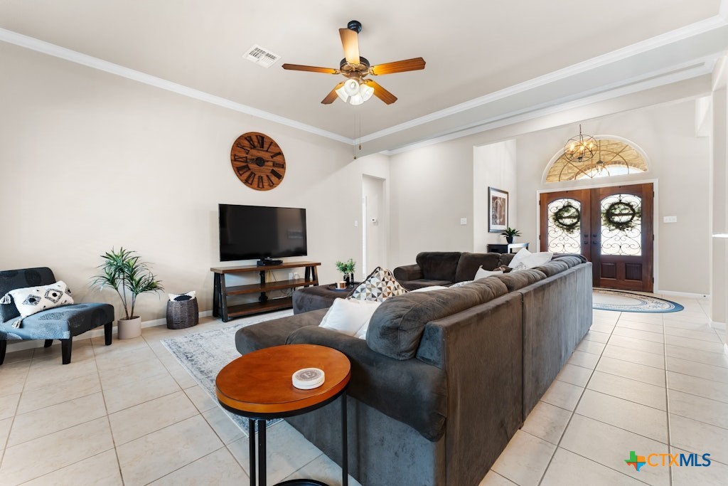 430 Archstone Loop Belton, TX 76513 - Photo 9 of 40 a living room with furniture a rug and a window