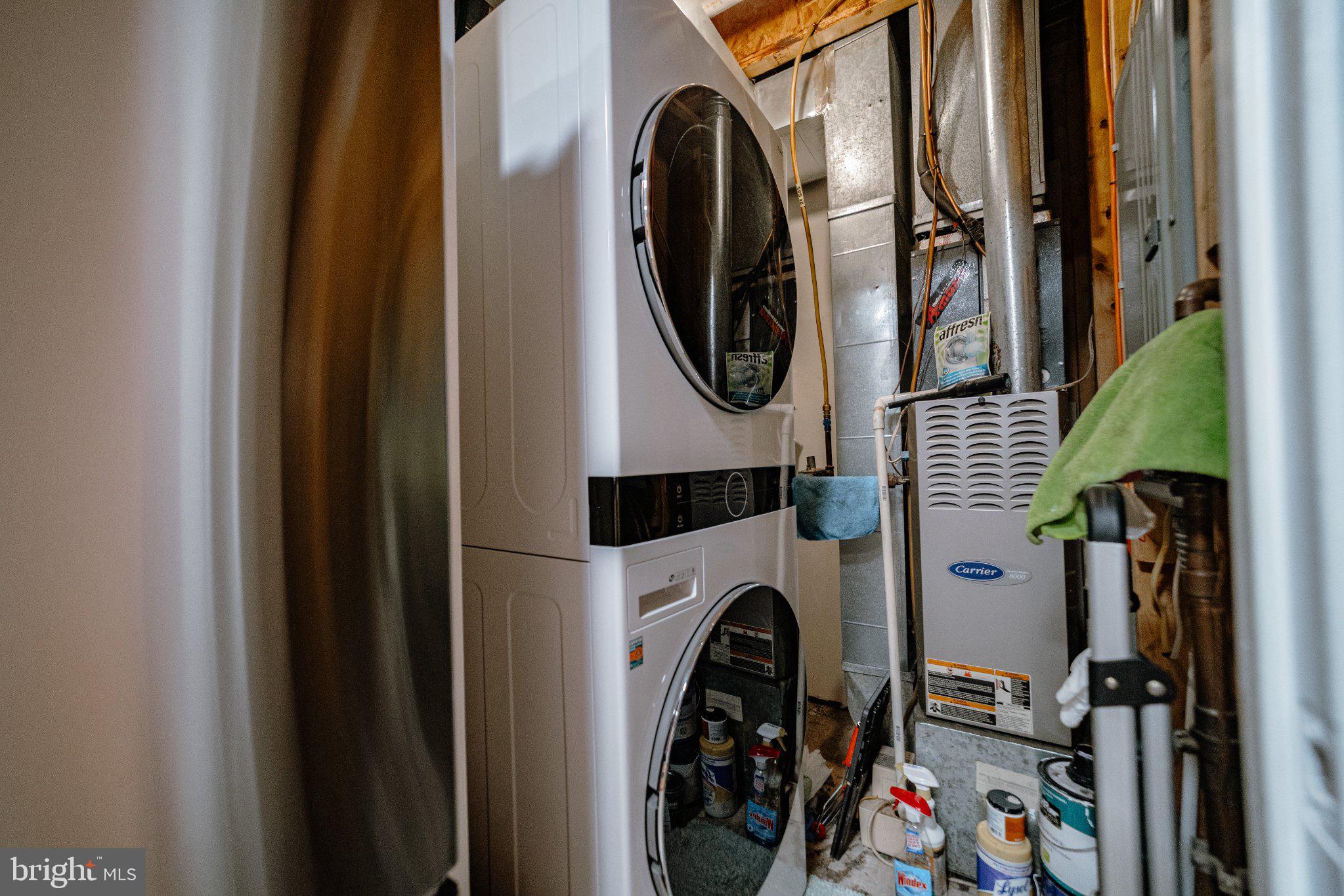 2205 Southgate Square, Unit 2205 Reston, VA 20191 - Photo 8 of 26 Efficient laundry space in a cozy home.