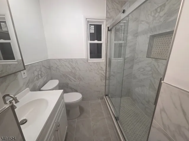 a bathroom with a sink and toilet