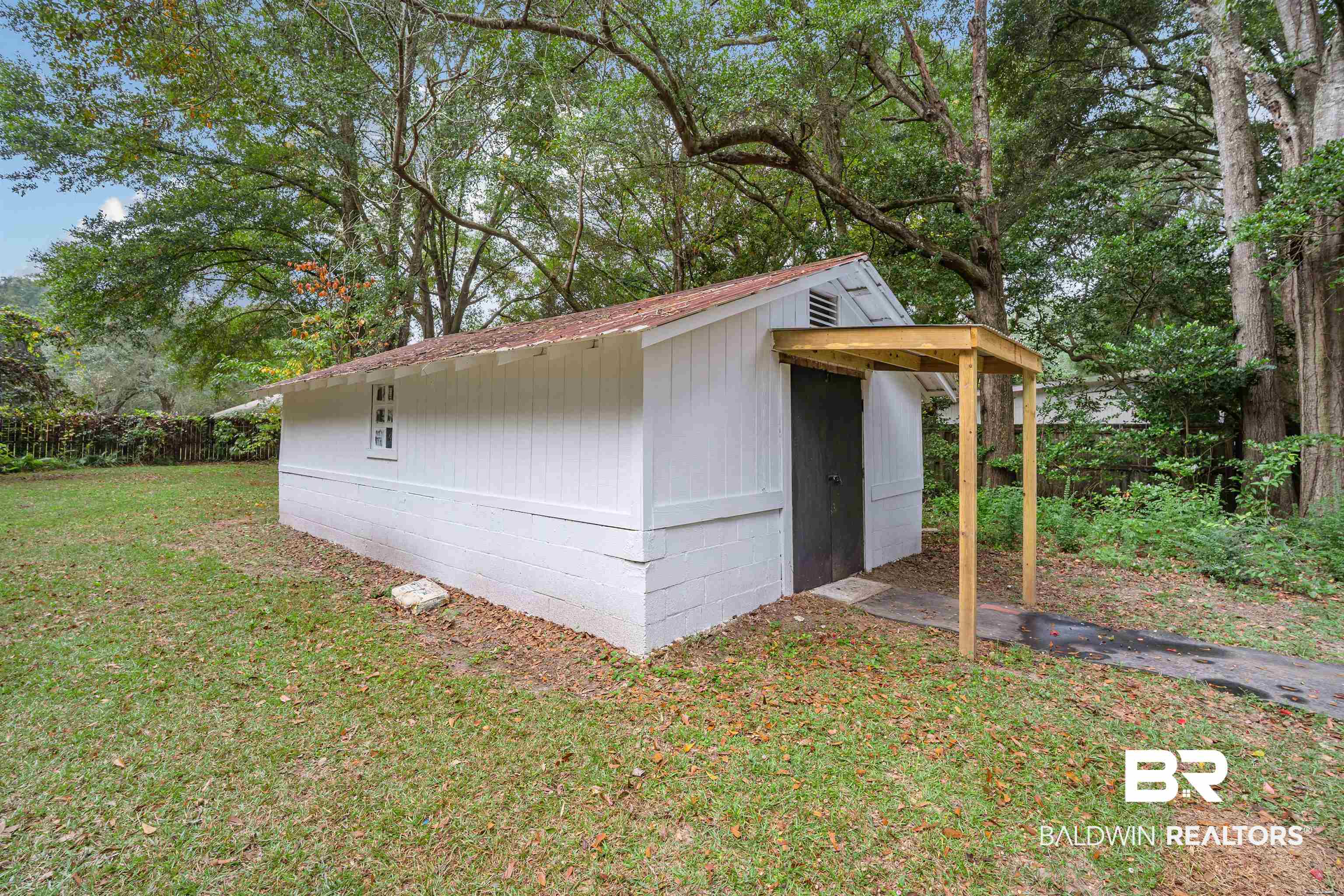 2261 Island Road Mobile, AL 36605 - Photo 24 of 25 View of outdoor structure with view of scattered trees