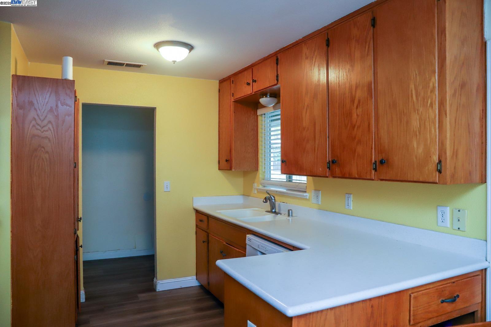 4295 North Archie Avenue Fresno, CA 93726 - Photo 16 of 23 a bathroom with a sink and a mirror