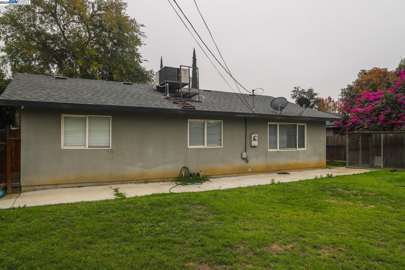 4295 North Archie Avenue Fresno, CA 93726 - Photo 23 of 23 a front view of house with yard