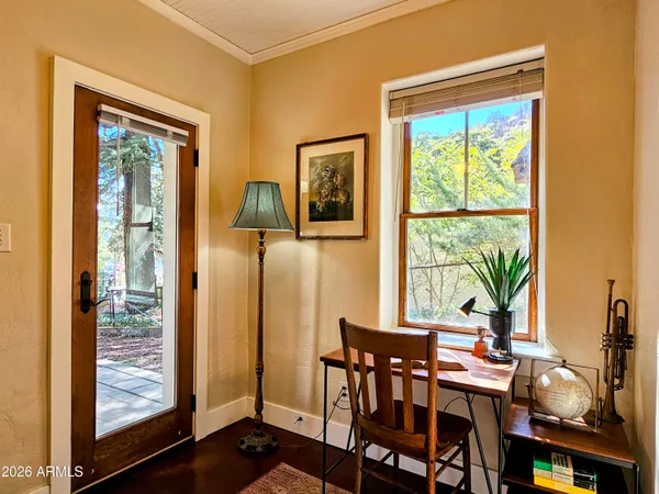 a view of a livingroom with furniture and window