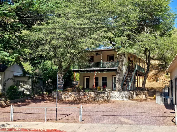 a front view of a house with yard
