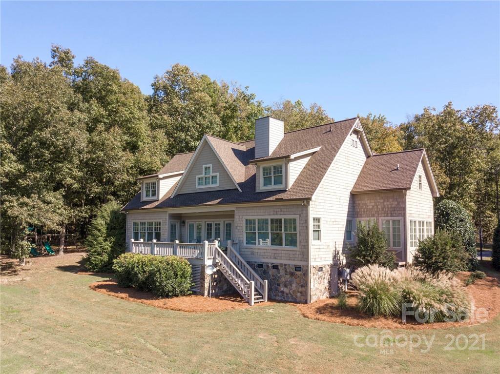 1755 St Johns Church Road Concord, NC 28025 - Photo 3 of 41 a view of a house with a garden and pathway