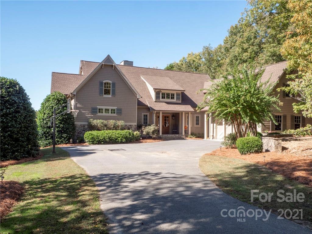 1755 St Johns Church Road Concord, NC 28025 - Photo 5 of 41 a front view of a house with a yard