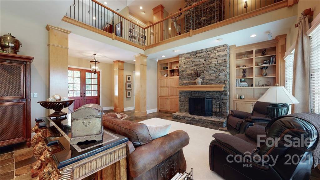 1755 St Johns Church Road Concord, NC 28025 - Photo 10 of 41 a living room with furniture and a fireplace
