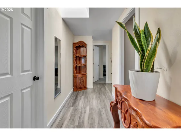a view of entryway with wooden floor