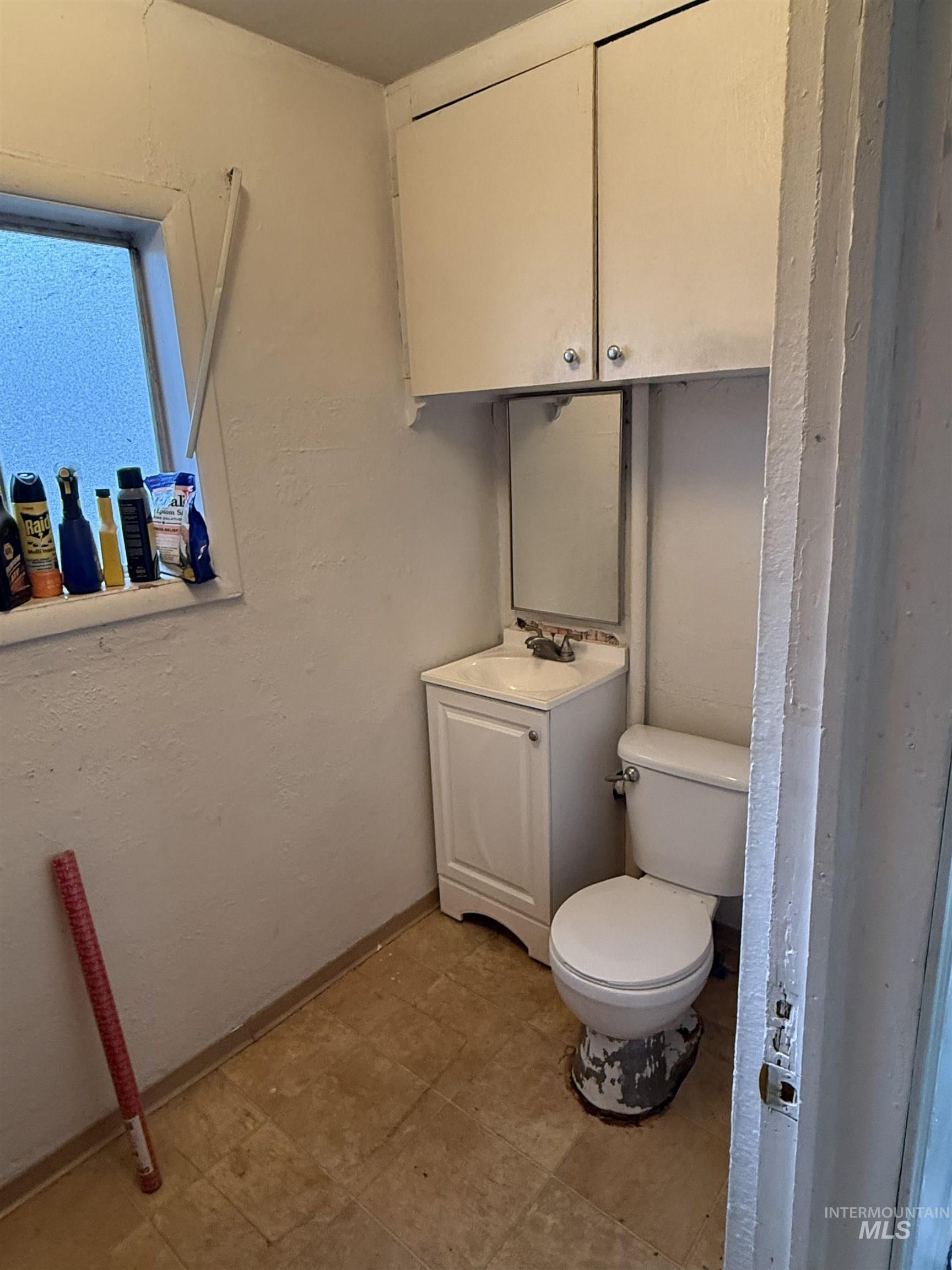 838 11th Street Clarkston, WA 99403 - Photo 7 of 20 Bathroom featuring toilet and vanity
