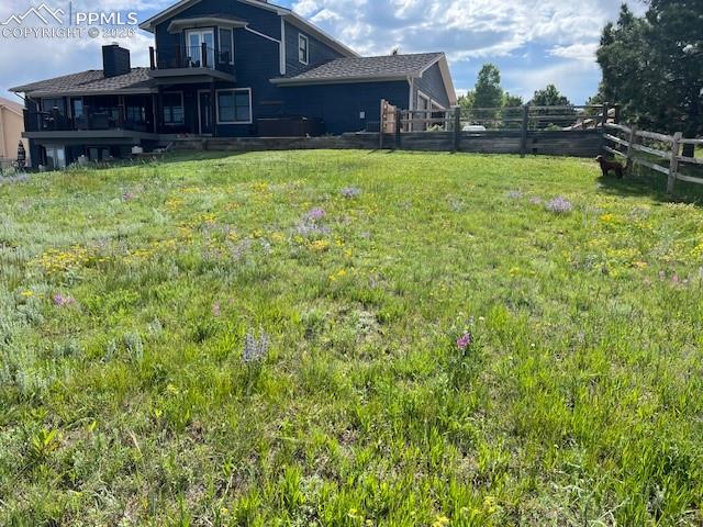 17840 New London Road Monument, CO 80132 - Photo 35 of 42 Large back yard with wildflowers (in season)