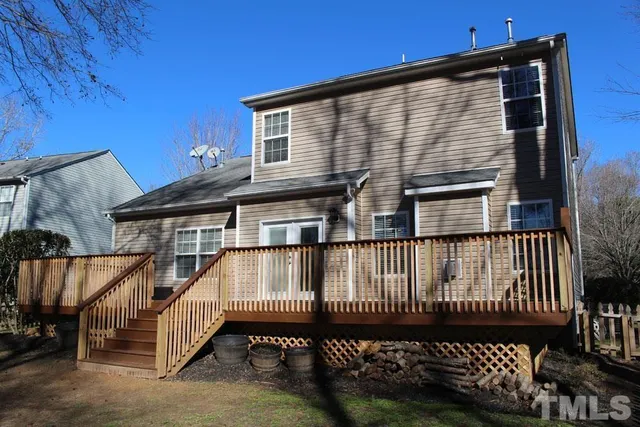 a view of a backyard with trees
