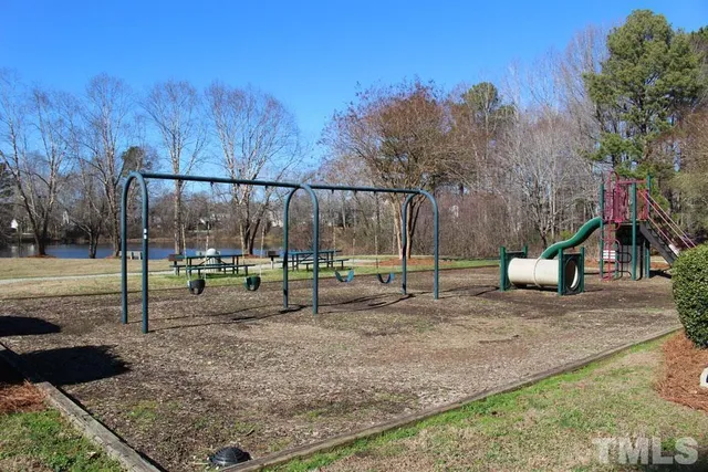 a view of a park with swings