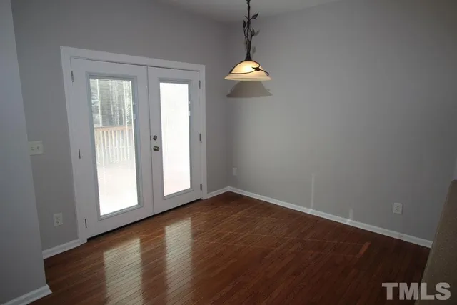 a view of a storage and utility room with sink