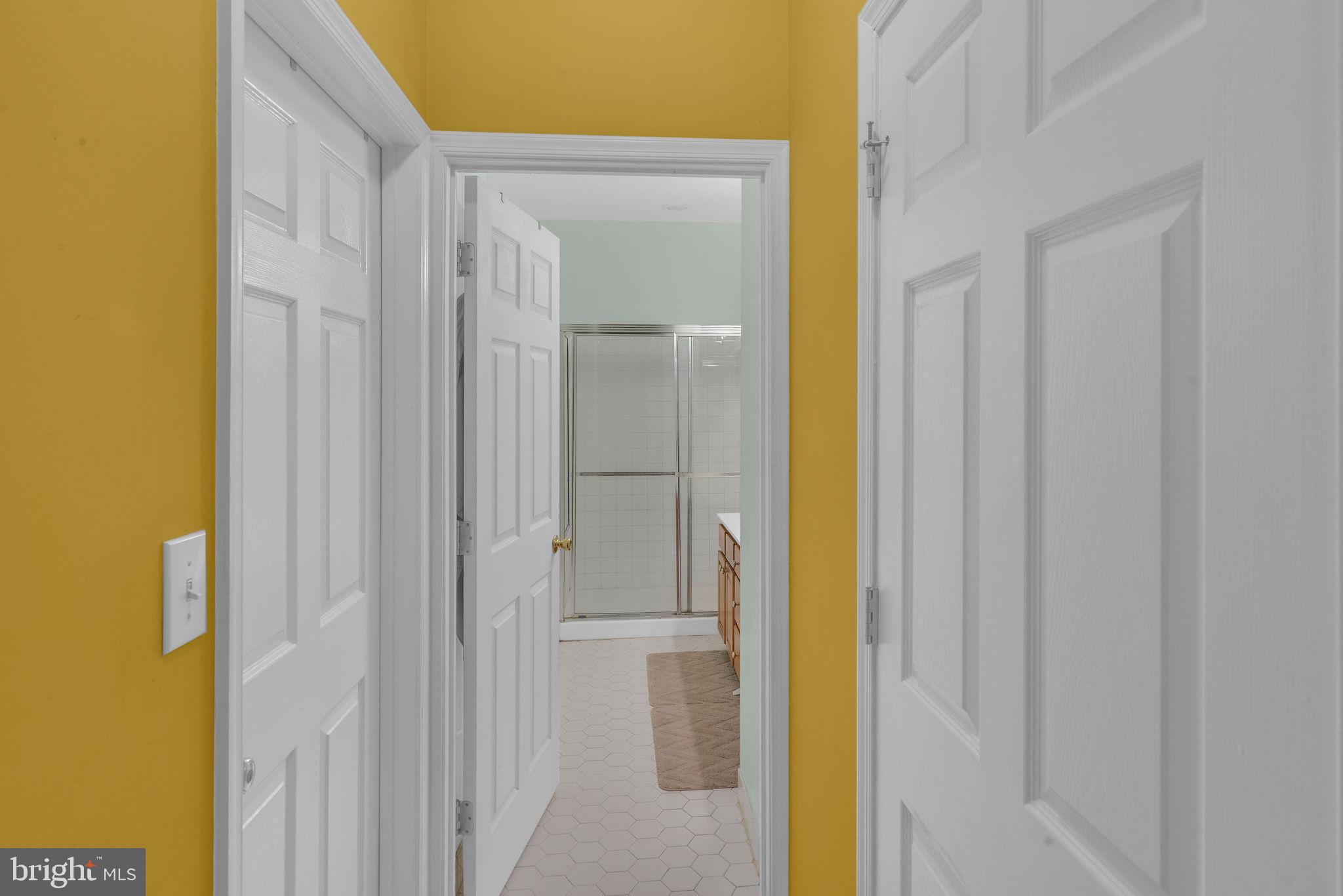 16 Cardiff Court Princeton Junction, NJ 08550 - Photo 26 of 60 a bathroom with a glass shower door