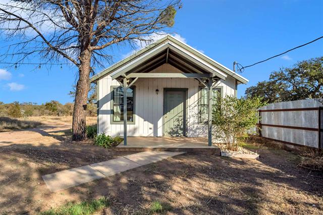 8164 Ranch Road 261 Buchanan Dam, TX 78609 - Photo 17 of 20 a view of a house with a yard