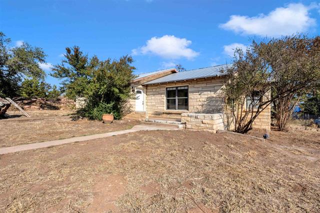 8164 Ranch Road 261 Buchanan Dam, TX 78609 - Photo 8 of 20 a view of a house with a yard