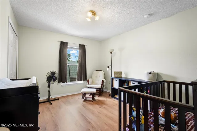 a view of a workspace with furniture and toys