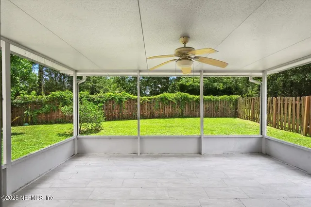 a view of a room with porch and a floor to ceiling window