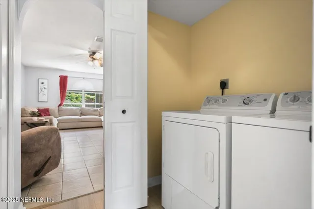 a utility room with dryer and washer