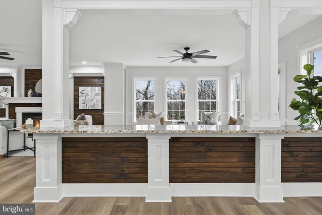 a bathroom with double vanity sinks and a mirror