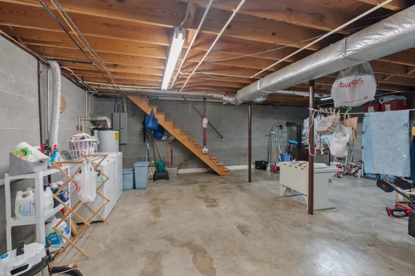 a view of an empty room with storage