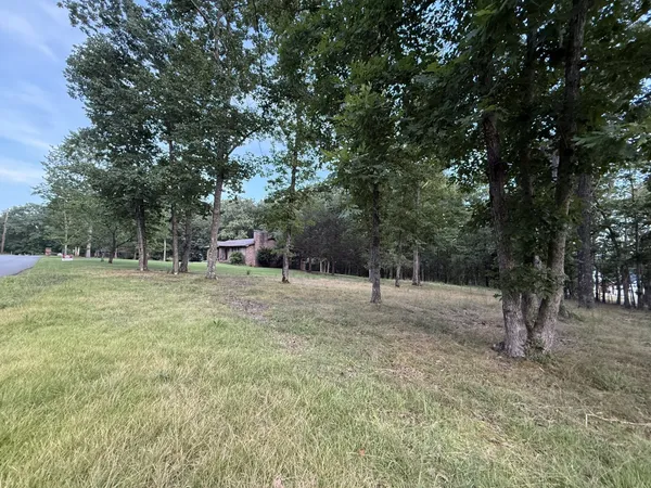 a fire hydrant in the middle of a field