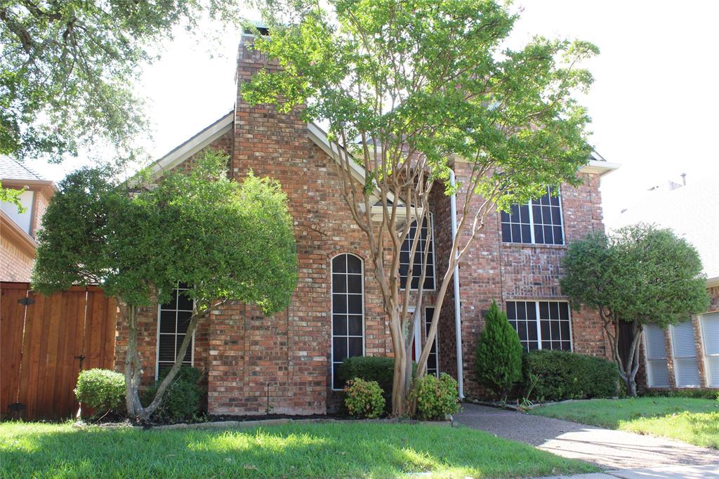 4033 Cornish Place Plano, TX 75093 - Photo 2 of 23 a view of a house with a yard