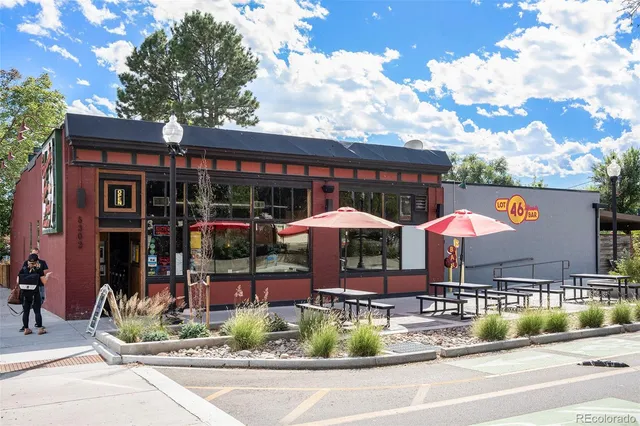 a view of street with sitting area