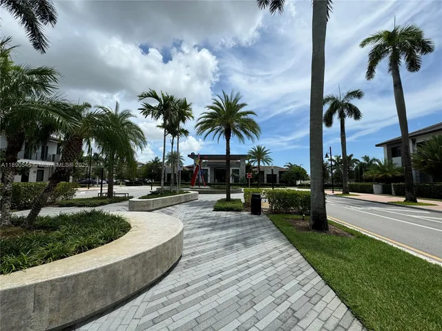 a swimming pool with outdoor seating