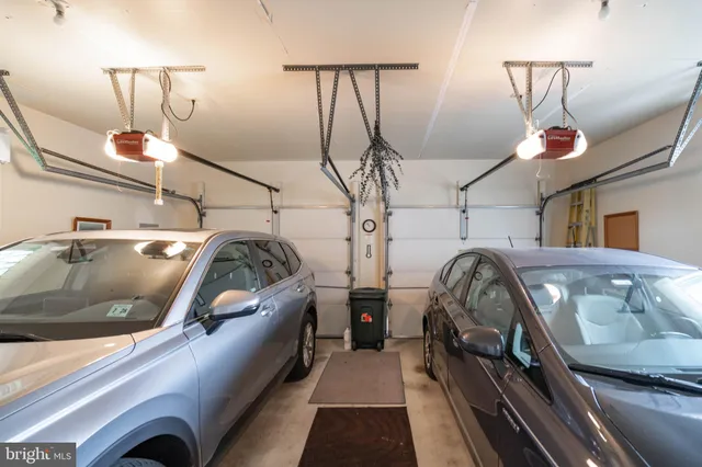 a view of yard with swimming pool and green space