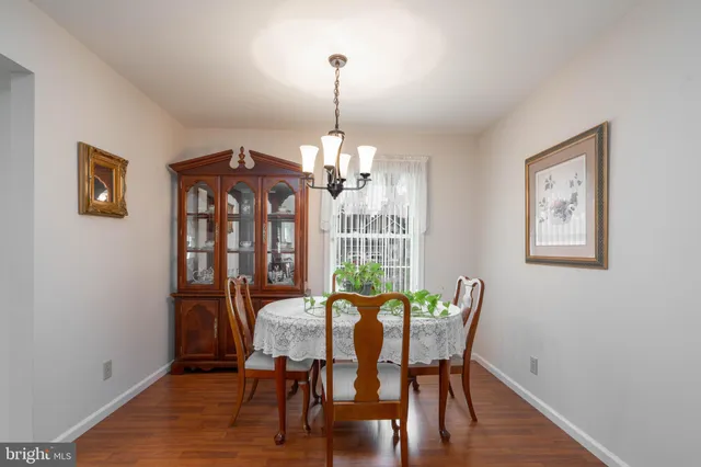 a kitchen with stainless steel appliances a sink dishwasher stove and refrigerator