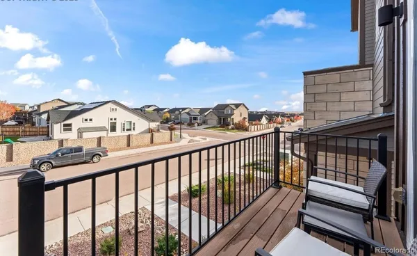 a view of a street from a balcony