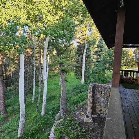 a view of a backyard with garden