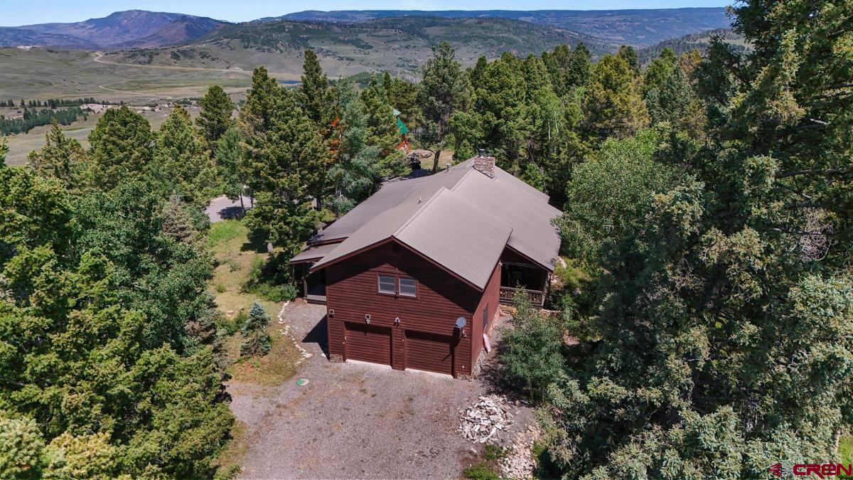 220 Ridge Road Cimarron, CO 81220 - Photo 38 of 45 an aerial view of a house with a yard