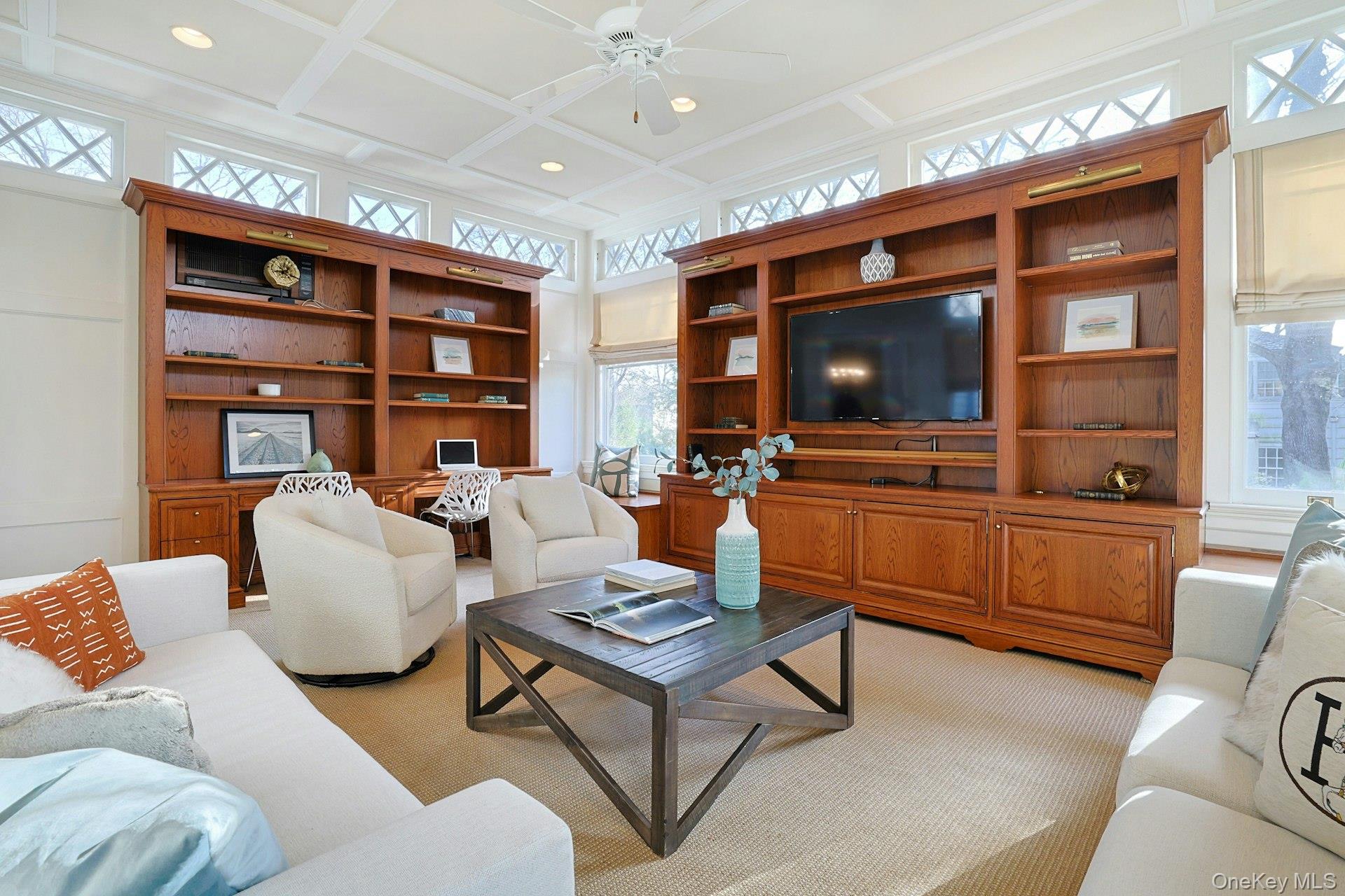34 Park Road Scarsdale, NY 10583 - Photo 11 of 49 a living room with furniture and a flat screen tv