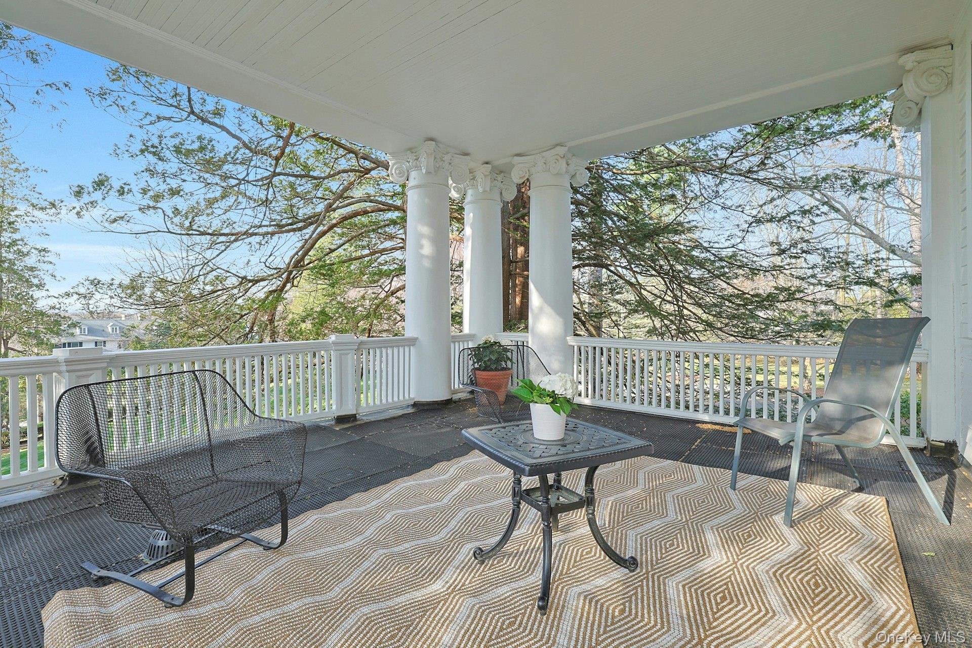 34 Park Road Scarsdale, NY 10583 - Photo 21 of 49 a view of a chairs and table in patio