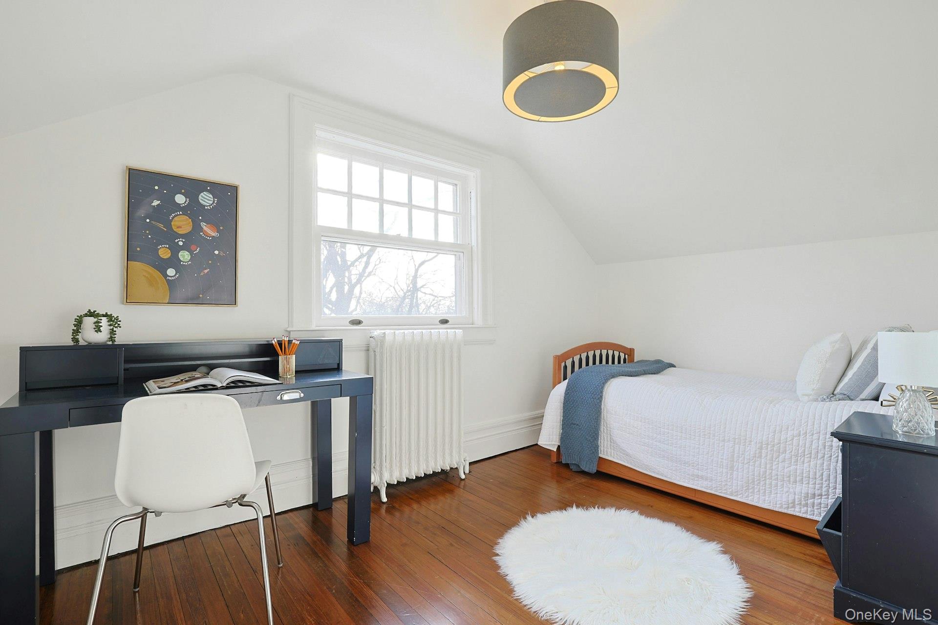 34 Park Road Scarsdale, NY 10583 - Photo 27 of 49 a bedroom with bed and a window